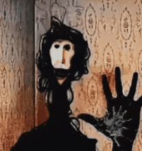 scary-dude-slamming-his-hand-against-the-screen-breaking-it (1).gif