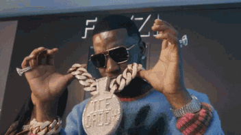 showing-off-my-necklace-gucci-mane (1).gif